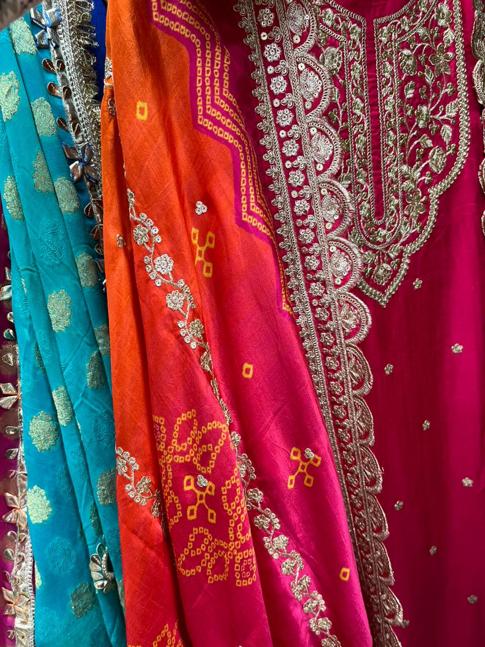 Pure Dola Silk with Bandhni Dupatta with Potli