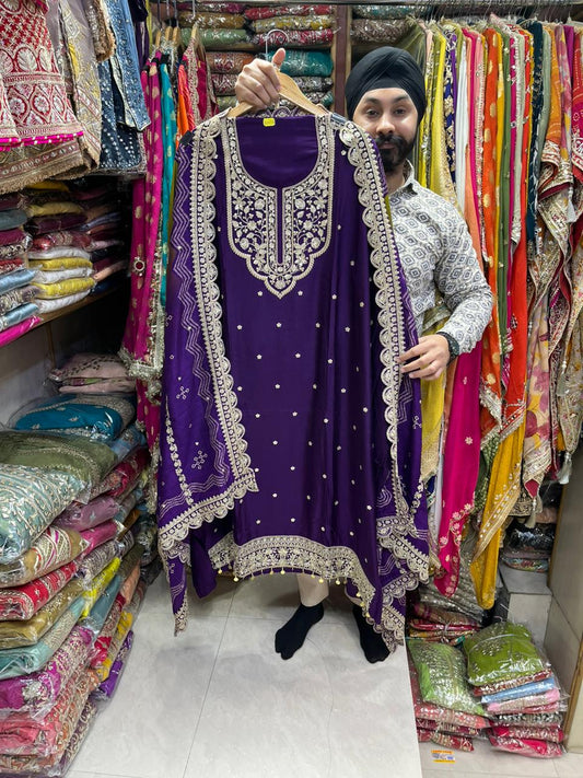 Pure Dola Silk with Bandhni Dupatta with Potli